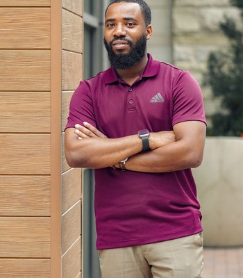 Portrait of Sam Ayansola, Realtor.