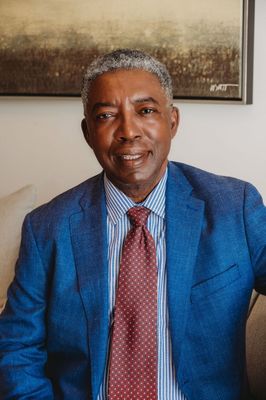 Portrait of Jude Okafor, Realtor.